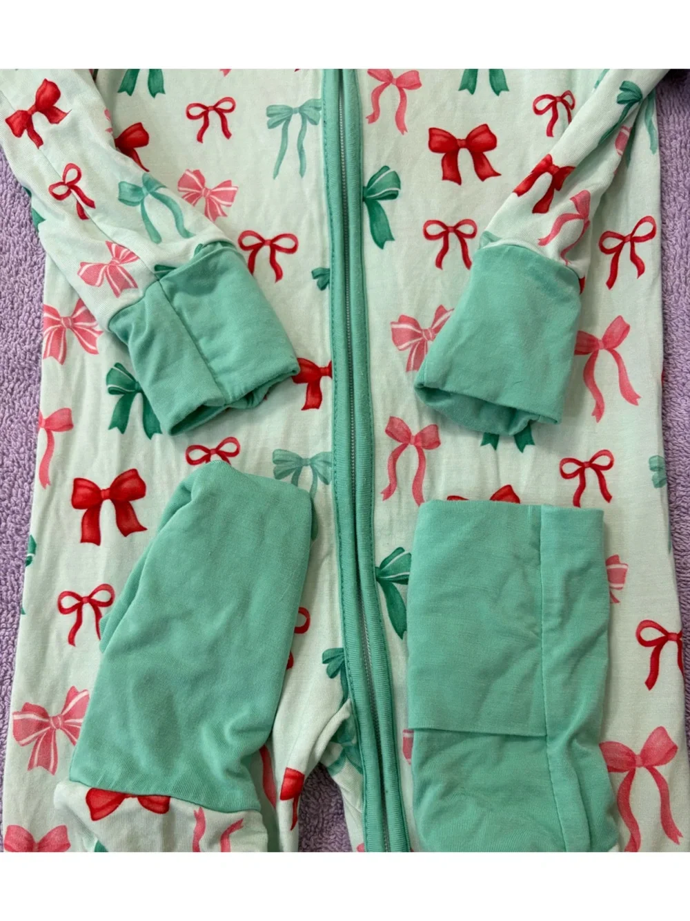 Holiday bows zip pajama